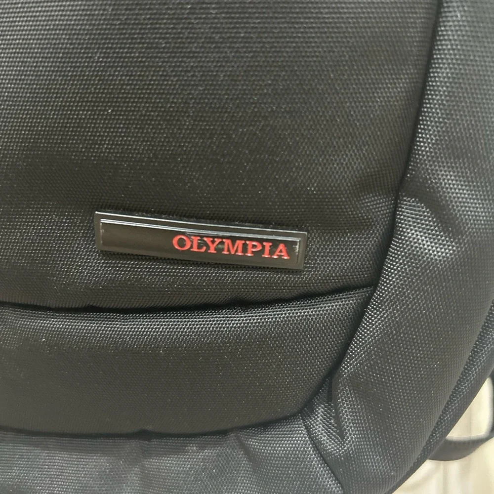 Compact Black Men's Backpack with Subtle Red Accents